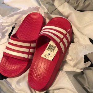 Pink adidas slides